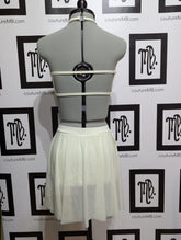 2 two piece with roushing mesh overlay and skirt